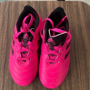 Toddler Girls pink cleats. Size 10 little kids.